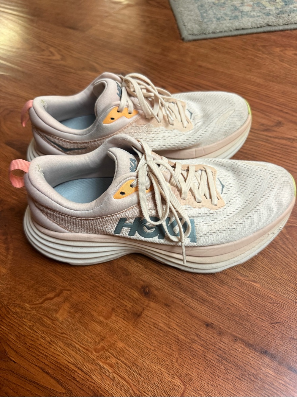 Hoka Women's Pale Pink Athletic Sneakers with Coral and Yellow Accents